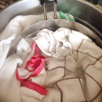 お鍋と布巾を煮洗い